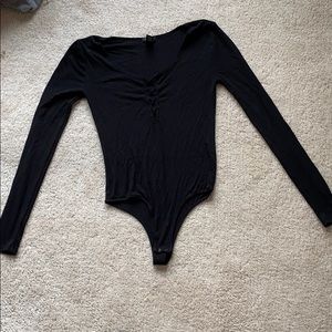 Black long sleeve ribbed body suit